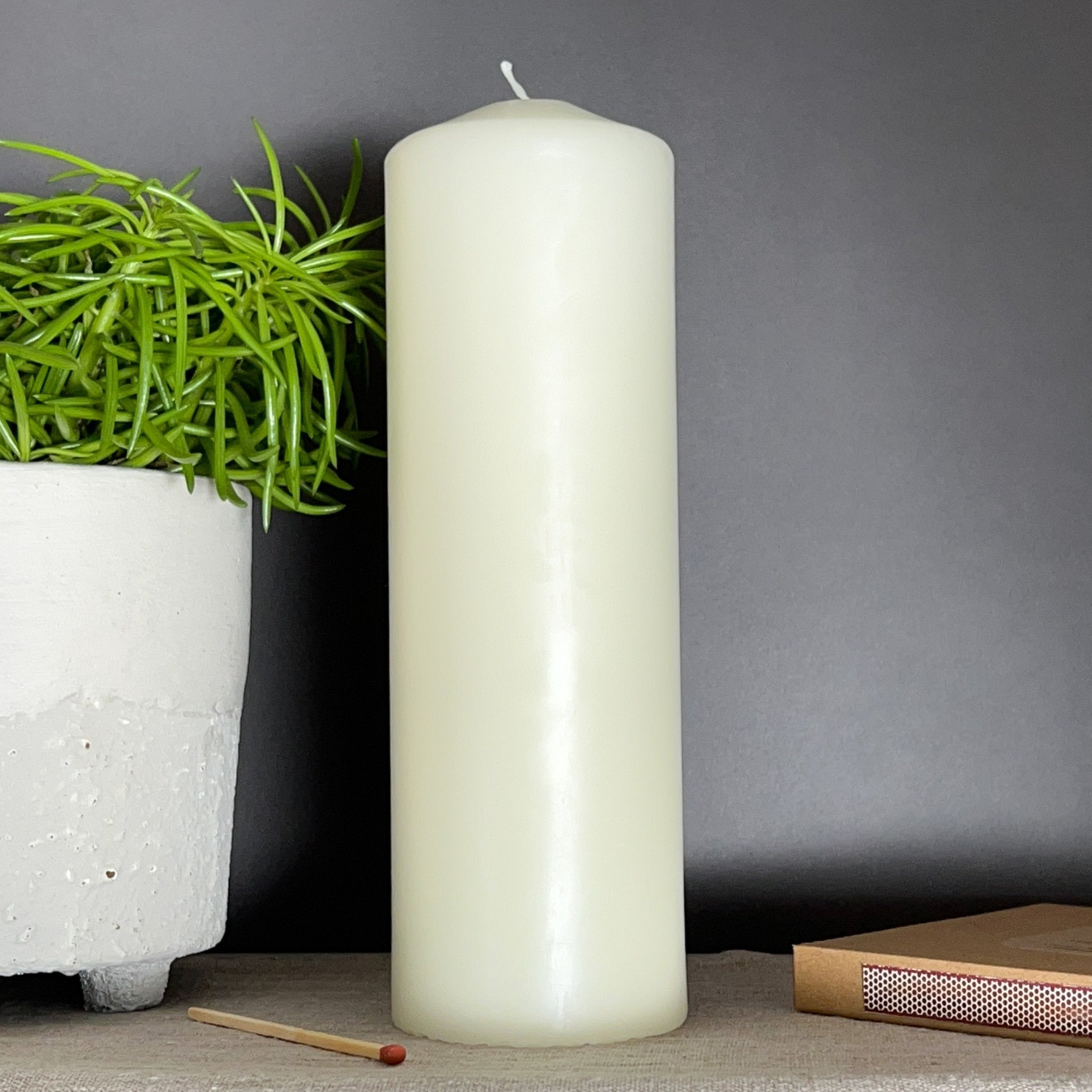 White pillar shop candles